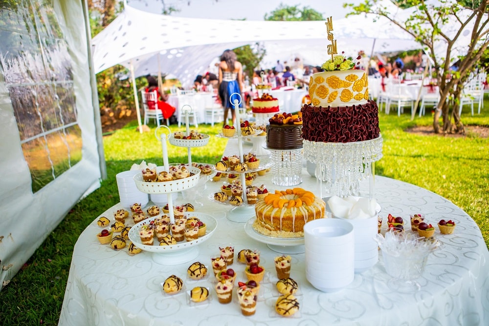 Desserts-white-table-outdoors-sunshine-marquee
